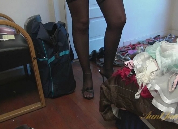 Taylor Lynn Does a Reverse Striptease.